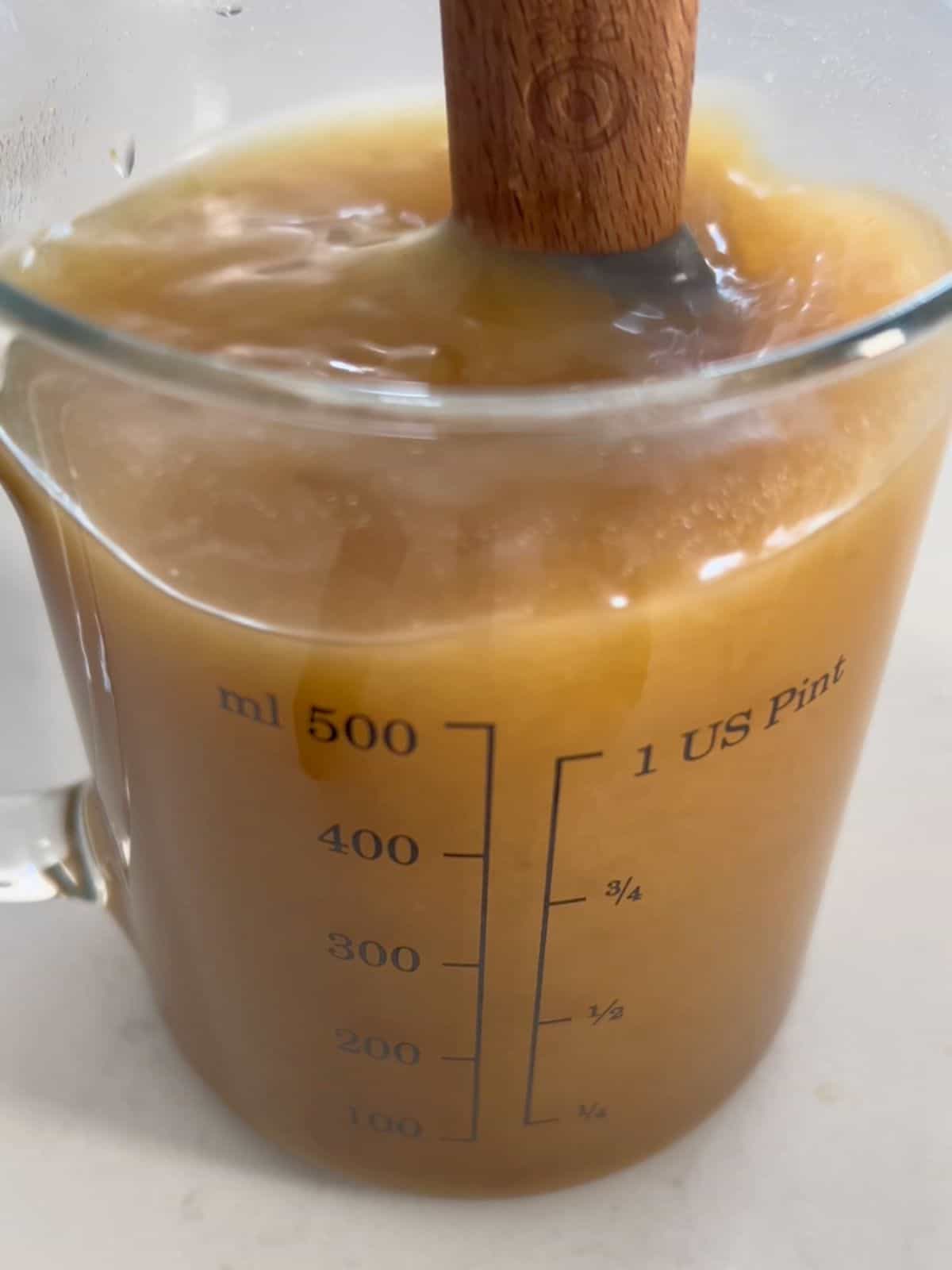 Dissolving Japanese curry roux cubes in warm water.