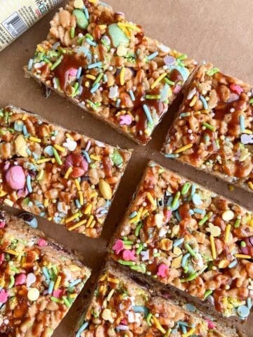 Fish sauce rice krispy treats cut into rectangles on a parchment paper.