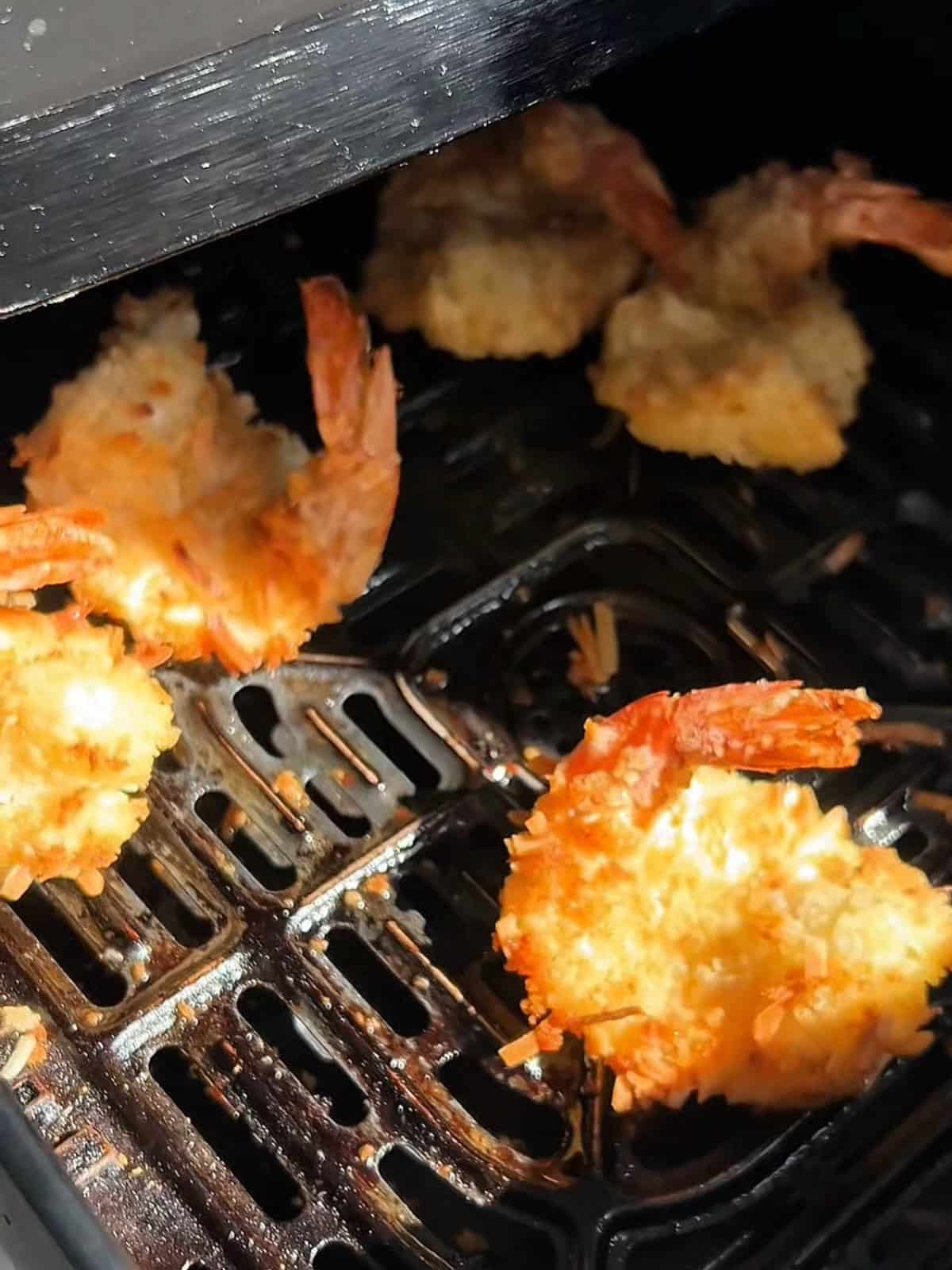 Golden brown and crispy coconut shrimp in the air fryer.