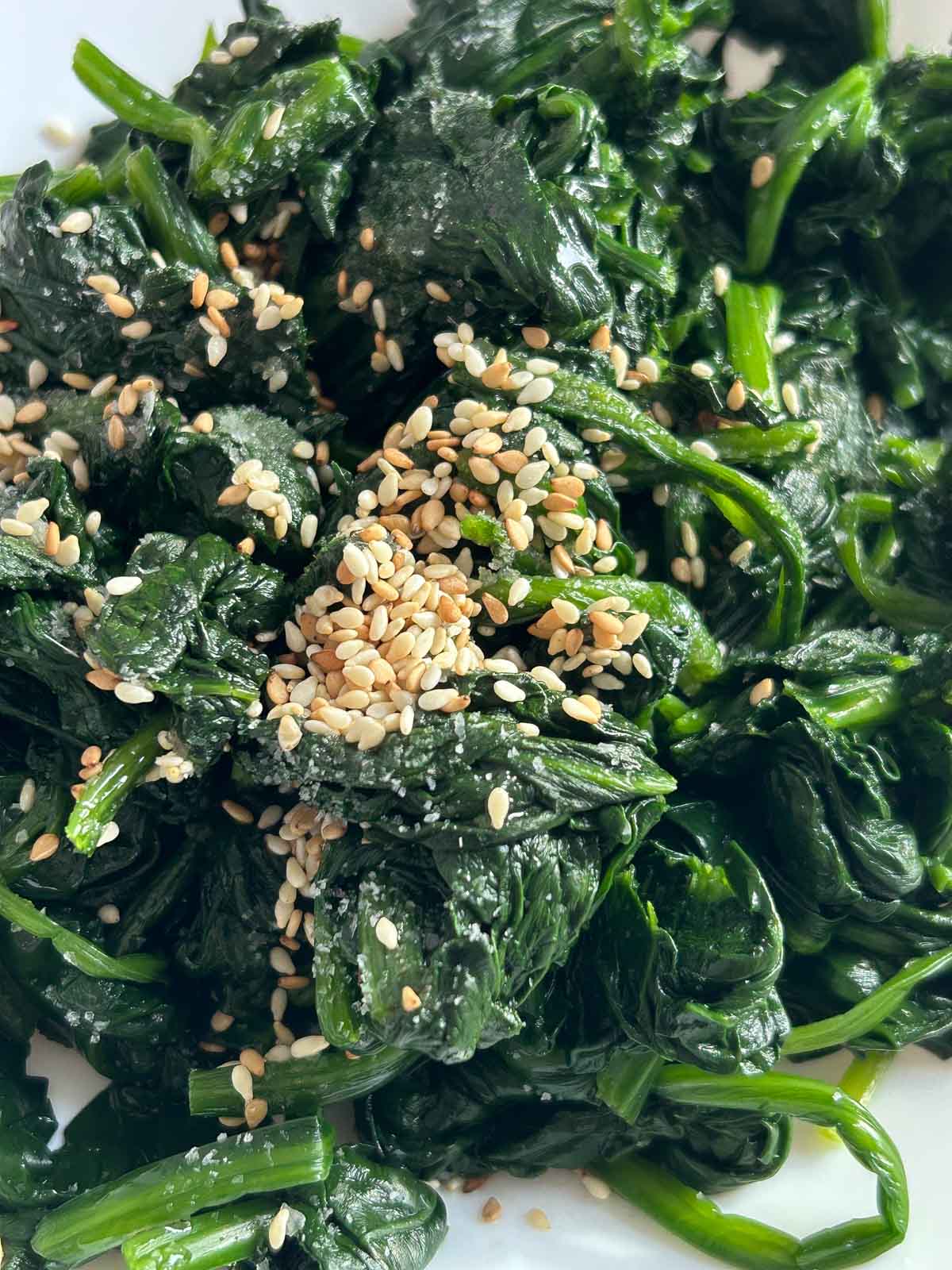 Blanched spinach with sesame oil, sesame seeds and salt.